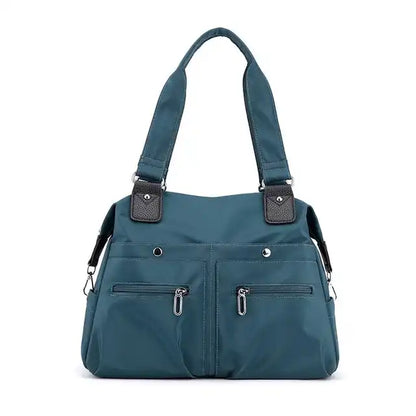 JoannStyle | Wasserdichte Umhängetasche mit gepolstertem Laptopfach