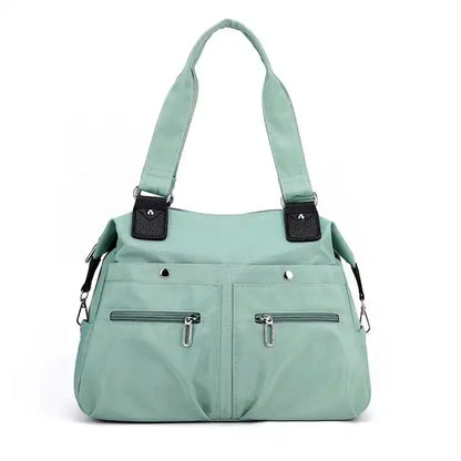JoannStyle | Wasserdichte Umhängetasche mit gepolstertem Laptopfach